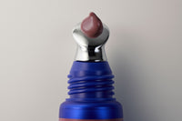 Load image into Gallery viewer, ZO Peptide Lip Volumizing Concentrate Mauve on applicator tip
